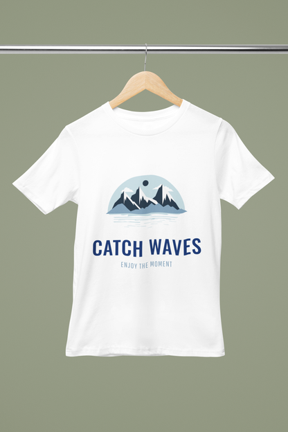 Catch Waves T Shirt mock‑up on white tee with"Catch Waves" surf‑style slogan and coastal font FOMO Fashions.